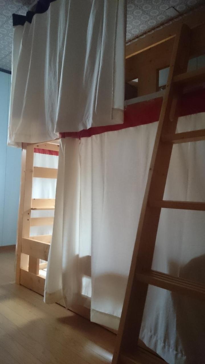Guest House Minna No Ie Achi Esterno foto